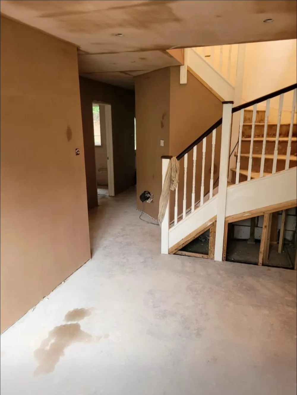 Fire or flood refurbishment plastering work in hallway